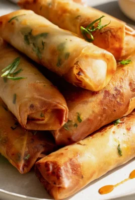 Gefüllte Airfryer Frühlingsrollen mit Tofu und frischen Kräutern genießen